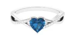 1.25 CT Heart Shape London Blue Topaz Crossover Ring with Diamond