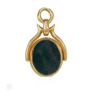 Antique gold, bloodstone, and jasper swivel locket