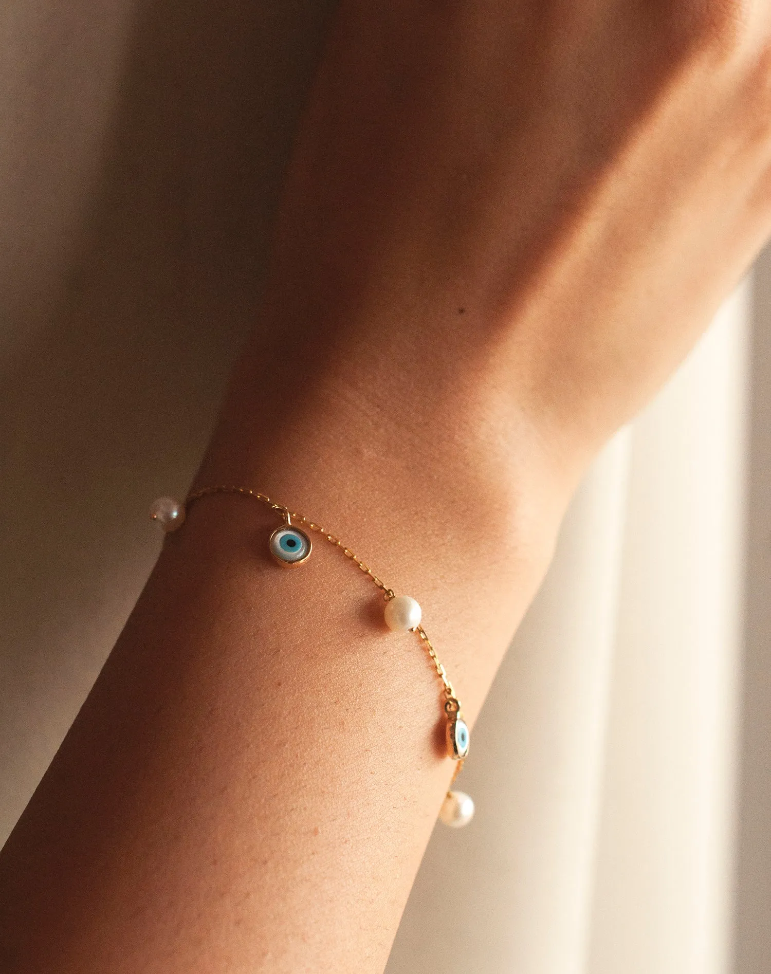 Evil Eye and Pearl Bracelet