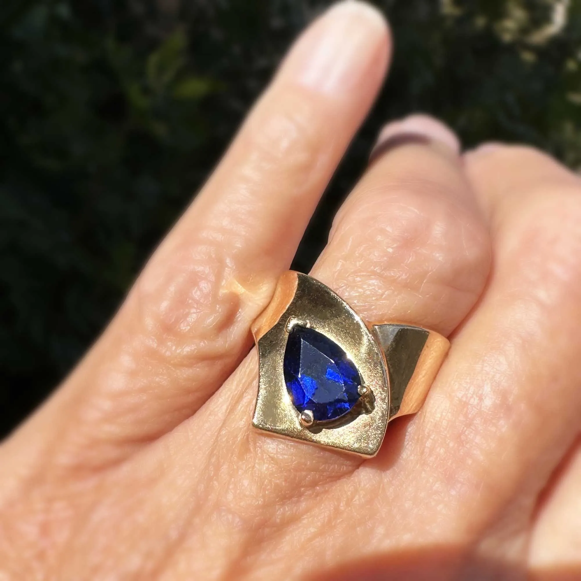 Modernist Wide Gold Cross Over Band Sapphire Ring