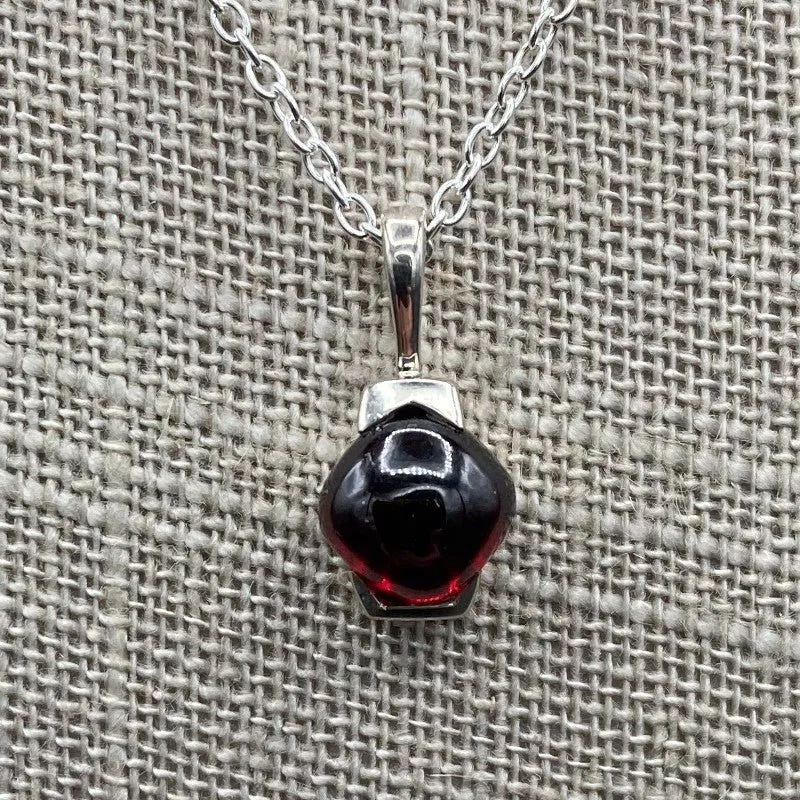 Sterling Silver And Modest Garnet Pendant Necklace