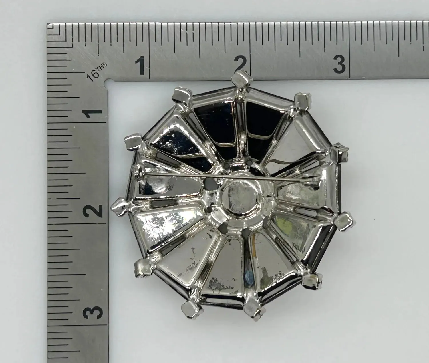 Vintage Gray Rhinestone Pinwheel Brooch